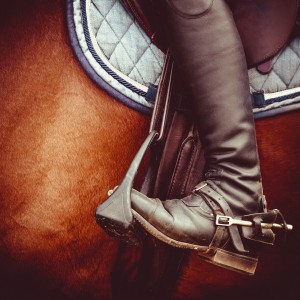 jockey riding boot, horses saddle and stirrup